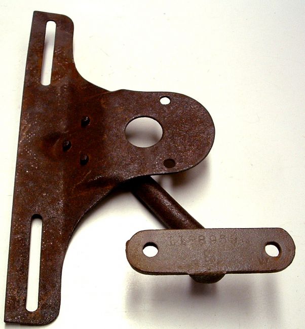 Driver's Side Taillight Bracket
This is the cast iron bracket most commonly found on 1946 through early 1951 WDX-B3PW model Power-Wagons with the early first series four pocket express bed. The part number for the cast arm part of the assembly is shown as 1188 959. 
